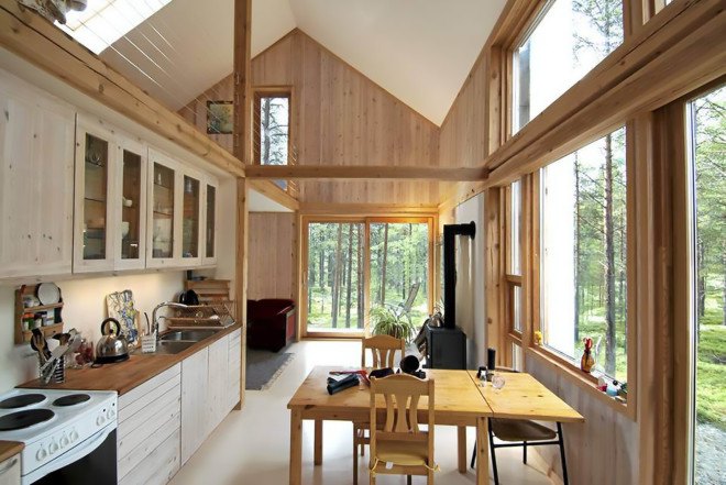 Gunnar Bloch Røsand, Gunnar’s House, timber cabin, pine cabin, cabin, Os i Østerdalen, Huus og Heim Arkitektur, Gunnar’s House by Huus og Heim Arkitektur, double-height room, double-height space, open plan, gabled end wall, gabled house,