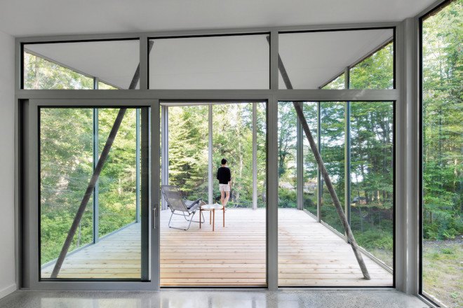 green roof, Paul Bernier, Lac Grenier, House on Lac Grenier, House on Lac Grenier by Paul Bernier, Montreal, timber house, cedar, cedar clad architecture, cedar clad house, timber architecture, cantilever, hickory units, daylight, natural lighting, patina,