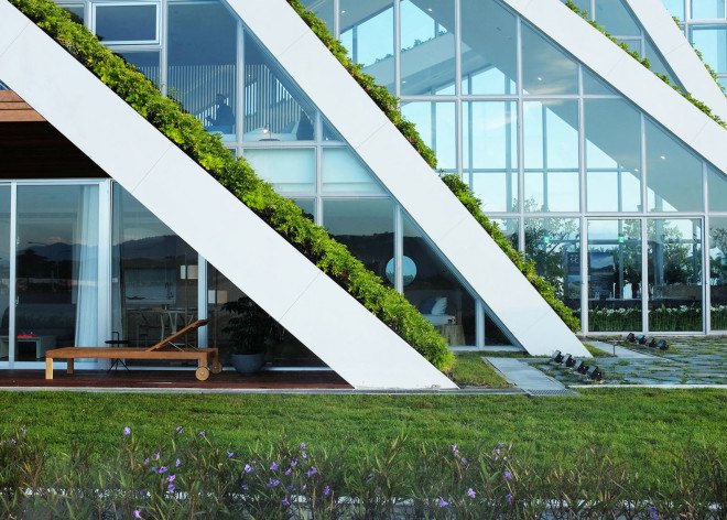 Hualien Wellness & Residential development, Taiwan, BIG, Bjarke Ingels Group, green roof, holiday home, active lifestyle, floor-to-ceiling windows, vernacular architecture, green architecture