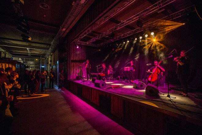 Savioz Fabrizzi Architects, Le Port Franc, Le Port Franc by Savioz Fabrizzi Architects, music venue, shipping containers, shipping container architecture, cargotecture, Sion, Le Port Franc sion, concert hall, shipping container music hall, shipping container bar,