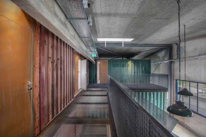 Savioz Fabrizzi Architects, Le Port Franc, Le Port Franc by Savioz Fabrizzi Architects, music venue, shipping containers, shipping container architecture, cargotecture, Sion, Le Port Franc sion, concert hall, shipping container music hall, shipping container bar,