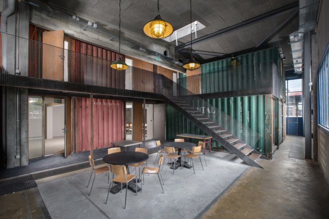 Savioz Fabrizzi Architects, Le Port Franc, Le Port Franc by Savioz Fabrizzi Architects, music venue, shipping containers, shipping container architecture, cargotecture, Sion, Le Port Franc sion, concert hall, shipping container music hall, shipping container bar,