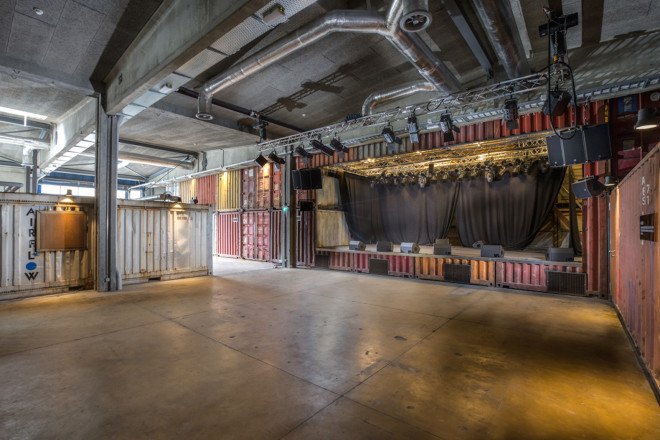 Savioz Fabrizzi Architects, Le Port Franc, Le Port Franc by Savioz Fabrizzi Architects, music venue, shipping containers, shipping container architecture, cargotecture, Sion, Le Port Franc sion, concert hall, shipping container music hall, shipping container bar,