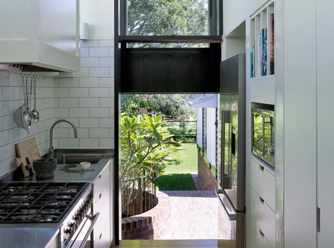 Queensland, Queenslander bungalow, Australia, Vokes and Peters, green renovation, heritage buildings, wooden facade, timber, green extension, timber architecture