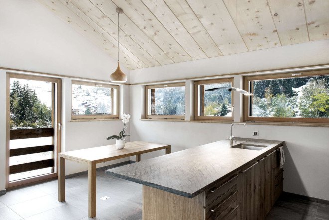 Larch barn, barn renovation, Alp'Architecture sàrl, green renovation, timber architecture, Minergie certification, energy efficiency, solar panels, Switzerland, low energy consumption, energy-efficient home