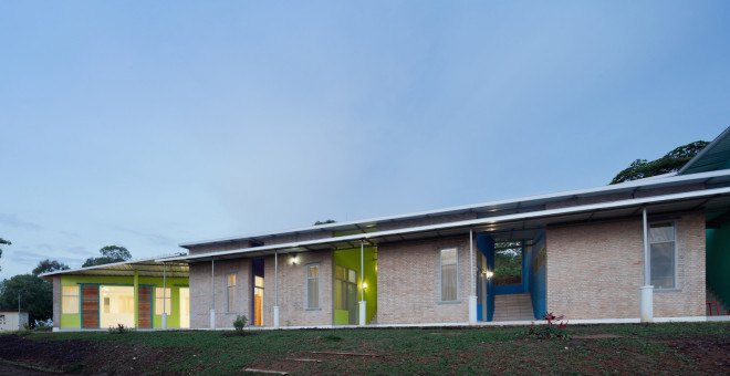 Kigutu, Burundi, corrugated metal, Louise Braverman, Village Health Works Staff Housing, Village Health Works, Village Health Works by Louise Braverman, solar array, solar power, off grid, off grid housing, rainwater collection, solar water heaters, local materials,