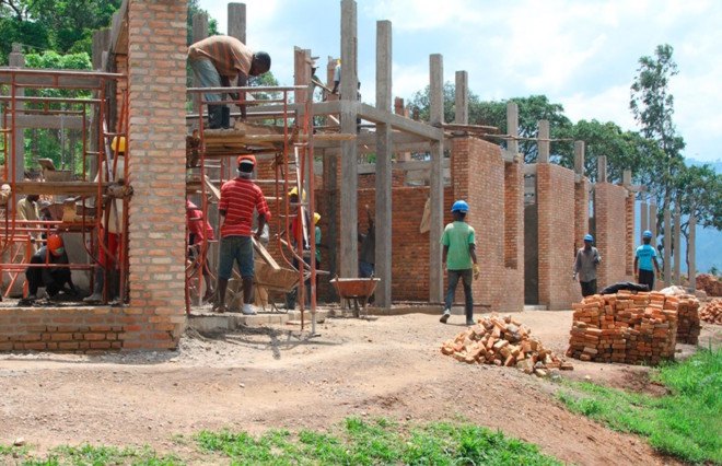 Kigutu, Burundi, corrugated metal, Louise Braverman, Village Health Works Staff Housing, Village Health Works, Village Health Works by Louise Braverman, solar array, solar power, off grid, off grid housing, rainwater collection, solar water heaters, local materials,