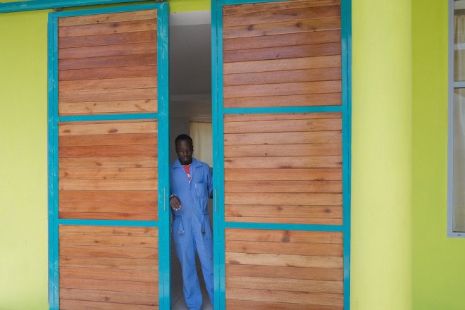 Kigutu, Burundi, corrugated metal, Louise Braverman, Village Health Works Staff Housing, Village Health Works, Village Health Works by Louise Braverman, solar array, solar power, off grid, off grid housing, rainwater collection, solar water heaters, local materials,