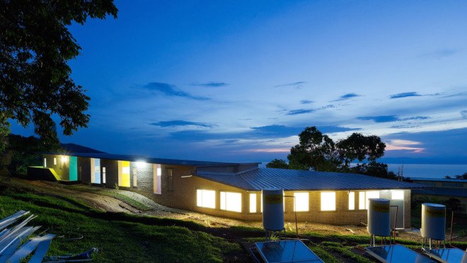Kigutu, Burundi, corrugated metal, Louise Braverman, Village Health Works Staff Housing, Village Health Works, Village Health Works by Louise Braverman, solar array, solar power, off grid, off grid housing, rainwater collection, solar water heaters, local materials,