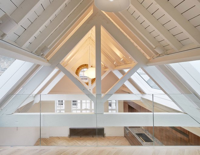 warehouse renovation, London, green renovation, skylights, Emrys Architects, slanted roofs, natural light, brickwork, brick building, historical building, listed building