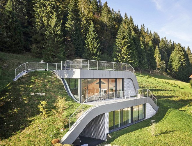 green roof, Casa Jura, Casa Jura by JDS Architects, JDS Architects, green roofed home, green roofed retreat, holiday home, holiday retreat, open plan layout, open plan, full height glazing, house built into a slope, walk on green roof, Jura mountains