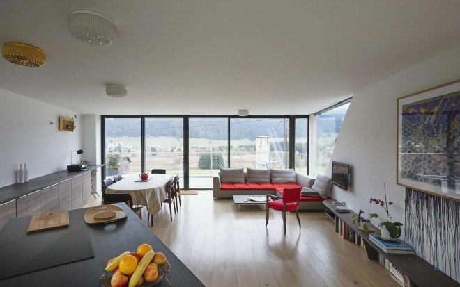 green roof, Casa Jura, Casa Jura by JDS Architects, JDS Architects, green roofed home, green roofed retreat, holiday home, holiday retreat, open plan layout, open plan, full height glazing, house built into a slope, walk on green roof, Jura mountains