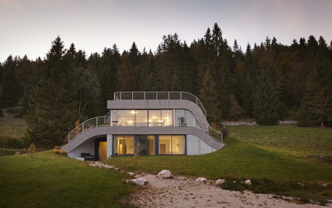 green roof, Casa Jura, Casa Jura by JDS Architects, JDS Architects, green roofed home, green roofed retreat, holiday home, holiday retreat, open plan layout, open plan, full height glazing, house built into a slope, walk on green roof, Jura mountains