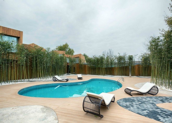 Elevation Workshop, Why Hotel, Bejing hotel hot springs, architecture, hotel architecture, timber-clad lodgings. timber hotels, bamboo fencing, green design, sustainable design, hotels in china, hotel design, bamboo grove, timber cabins, wood cabins, cabin design
