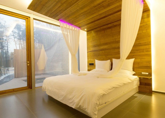 Elevation Workshop, Why Hotel, Bejing hotel hot springs, architecture, hotel architecture, timber-clad lodgings. timber hotels, bamboo fencing, green design, sustainable design, hotels in china, hotel design, bamboo grove, timber cabins, wood cabins, cabin design