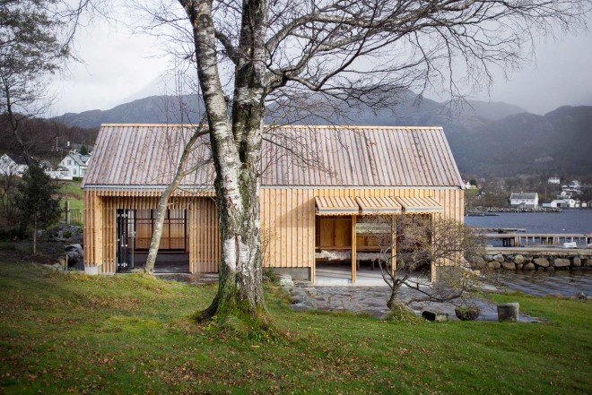 Koreo Arkitekter and Kolab Arkitekter, Norwegian boathouse, Naust V, heartwood pine, polycarbonate skin, vertical wooden louvers, Norwegian wood, Vikebygd, Oslo, restored boathouse