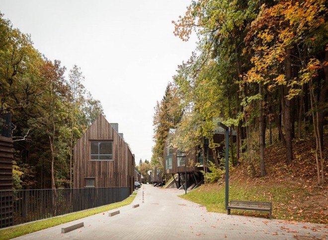 Paleko Arch Studija, Plazma Architekturos Studija, Rasu Namai by Paleko Arch Studija and Plazma Architekturos Studija, Rasu Namai, timber clad housing, ammunition vault, Vilnius, housing development