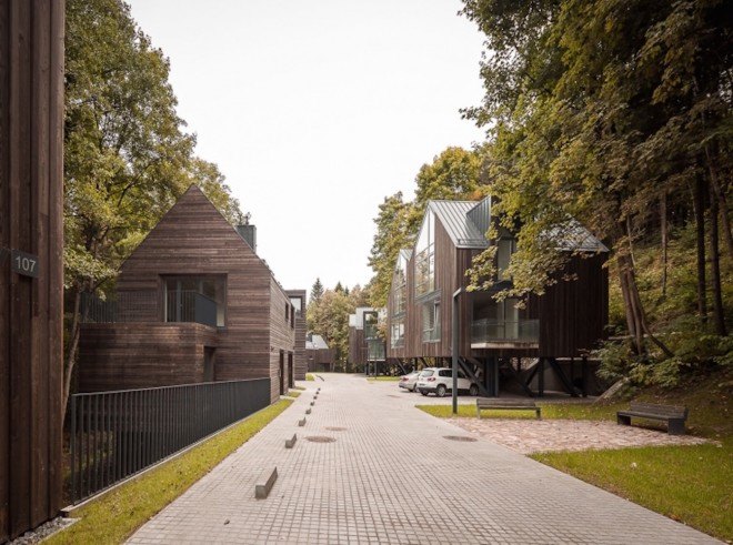 Paleko Arch Studija, Plazma Architekturos Studija, Rasu Namai by Paleko Arch Studija and Plazma Architekturos Studija, Rasu Namai, timber clad housing, ammunition vault, Vilnius, housing development