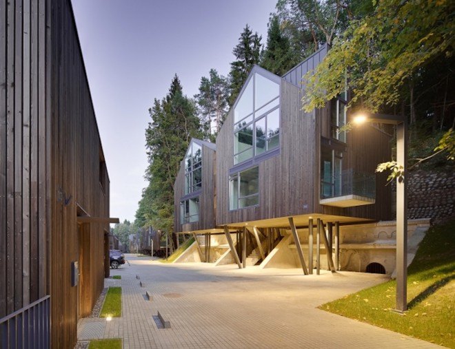 Paleko Arch Studija, Plazma Architekturos Studija, Rasu Namai by Paleko Arch Studija and Plazma Architekturos Studija, Rasu Namai, timber clad housing, ammunition vault, Vilnius, housing development