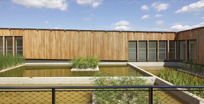 Les Bartelottes school complex, Paris, France, NOMADE architectes, green school, green roof, courtyard, solar energy, solar panels, natural light, rainwater harvesting, rainwater purification
