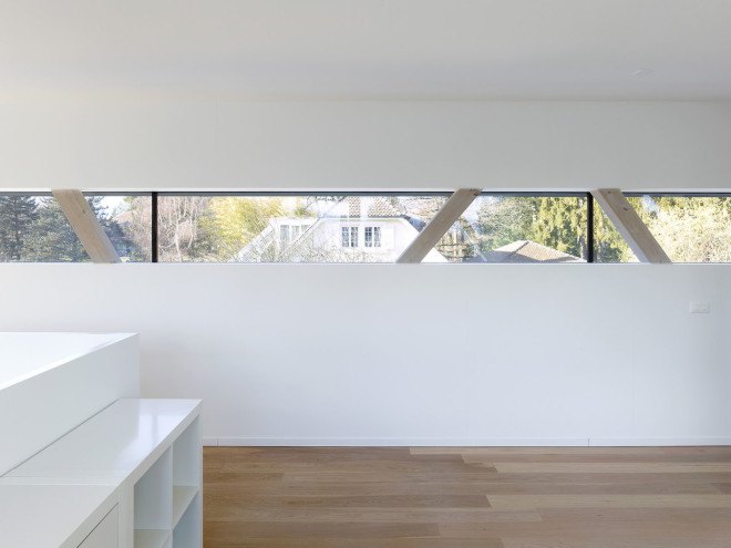 Tannay Bridge House, Christian von Düring, Switzerland, tiimber cladding, green architecture, family home, Geneva, open-plan layout, natural light, suburban house