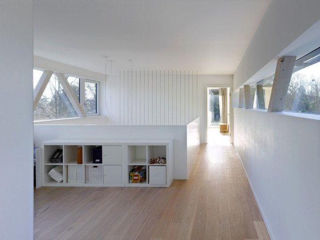 Tannay Bridge House, Christian von Düring, Switzerland, tiimber cladding, green architecture, family home, Geneva, open-plan layout, natural light, suburban house