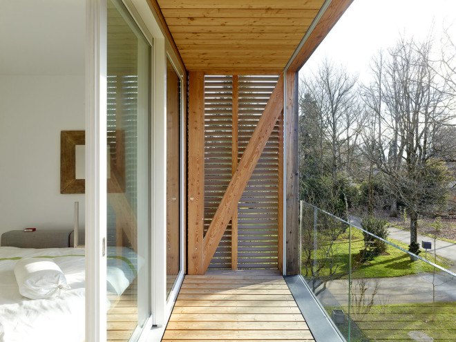 Tannay Bridge House, Christian von Düring, Switzerland, tiimber cladding, green architecture, family home, Geneva, open-plan layout, natural light, suburban house