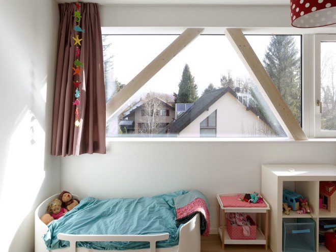 Tannay Bridge House, Christian von Düring, Switzerland, tiimber cladding, green architecture, family home, Geneva, open-plan layout, natural light, suburban house