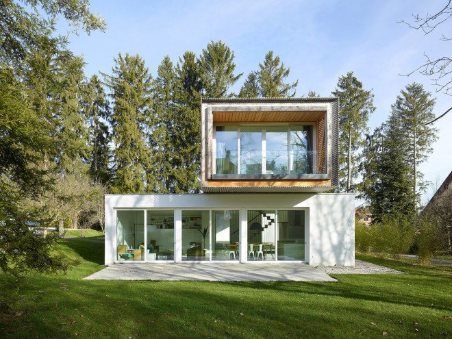 Tannay Bridge House, Christian von Düring, Switzerland, tiimber cladding, green architecture, family home, Geneva, open-plan layout, natural light, suburban house