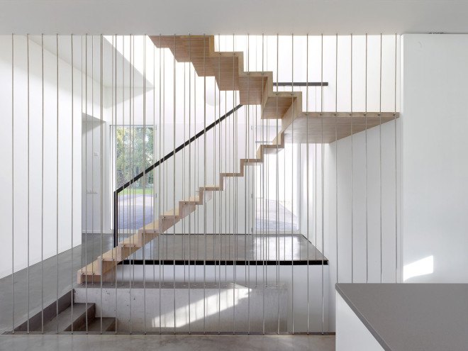 Tannay Bridge House, Christian von Düring, Switzerland, tiimber cladding, green architecture, family home, Geneva, open-plan layout, natural light, suburban house