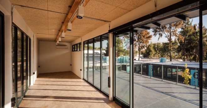 ATÖLYE Labs, cargotecture, shipping containers, repurposed shipping containers, iDEEGE Technopark, iDEEGE Technopark by ATÖLYE Labs, cargotecture tech campus, natural ventilation, repurposed materials,