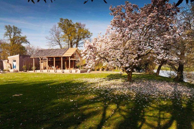 DeBossa, timber pavilion, indoor/outdoor space, split-level shelter, Dutch Mansion, The Netherlands, Eindhoven, Brabants Landschap, firewood storage, gable roof pavilion,