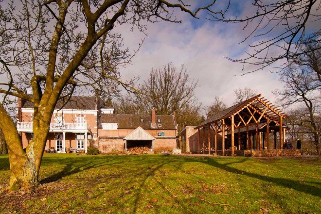 DeBossa, timber pavilion, indoor/outdoor space, split-level shelter, Dutch Mansion, The Netherlands, Eindhoven, Brabants Landschap, firewood storage, gable roof pavilion,