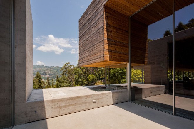 Gerês House, Carvalho Araújo, Portugal, green architecture, concrete house, timber facade, swimming pool, wooden mezzanine, natural light