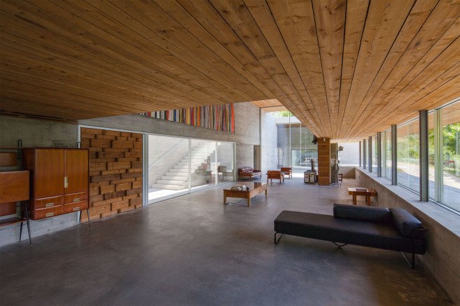 Gerês House, Carvalho Araújo, Portugal, green architecture, concrete house, timber facade, swimming pool, wooden mezzanine, natural light