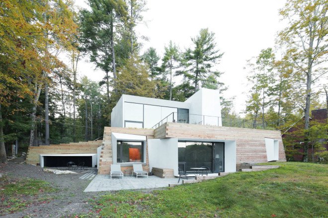 Lake house, Taylor and Miller Architecture and Design, timber wall, retaining wall, abstract design, green architecture, Massachusetts, skylights, natural light