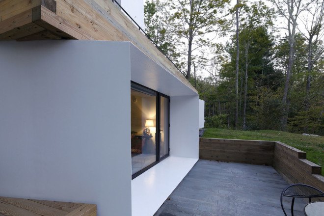 Lake house, Taylor and Miller Architecture and Design, timber wall, retaining wall, abstract design, green architecture, Massachusetts, skylights, natural light