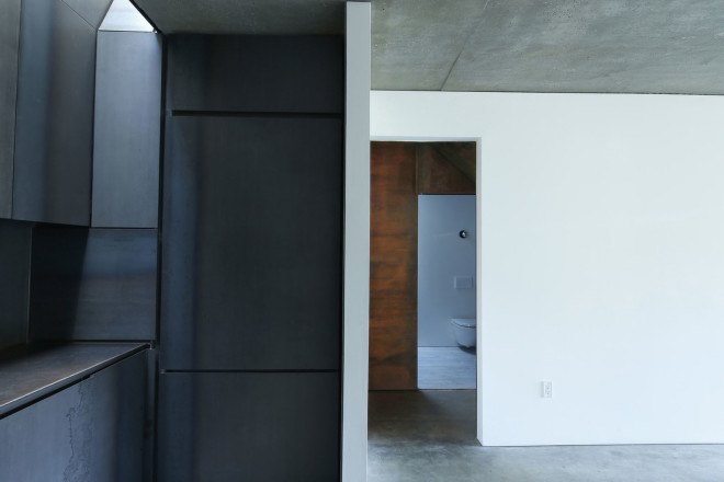 Lake house, Taylor and Miller Architecture and Design, timber wall, retaining wall, abstract design, green architecture, Massachusetts, skylights, natural light