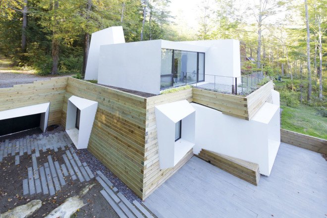 Lake house, Taylor and Miller Architecture and Design, timber wall, retaining wall, abstract design, green architecture, Massachusetts, skylights, natural light