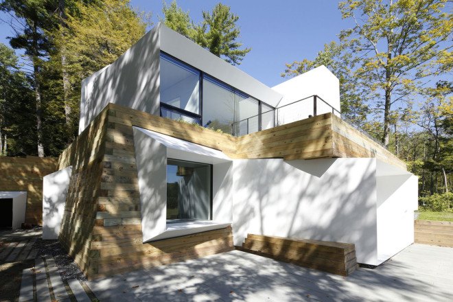 Lake house, Taylor and Miller Architecture and Design, timber wall, retaining wall, abstract design, green architecture, Massachusetts, skylights, natural light