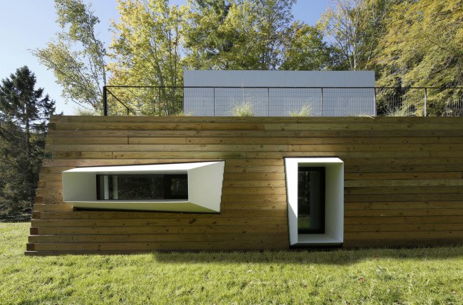 Lake house, Taylor and Miller Architecture and Design, timber wall, retaining wall, abstract design, green architecture, Massachusetts, skylights, natural light