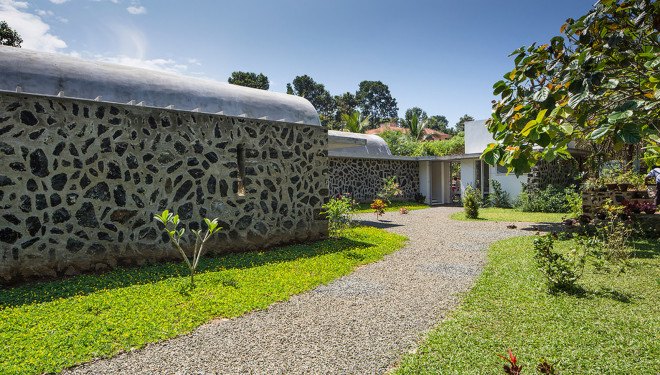 The Walls and Vaults House, India architecture, LIJO.RENY.architects, passive cooling, passive house, stone walls, granite, green architecture, multi-generational home, tropical plants