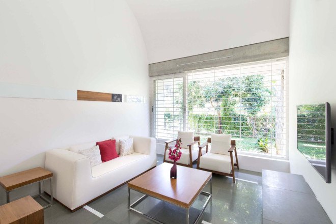 The Walls and Vaults House, India architecture, LIJO.RENY.architects, passive cooling, passive house, stone walls, granite, green architecture, multi-generational home, tropical plants