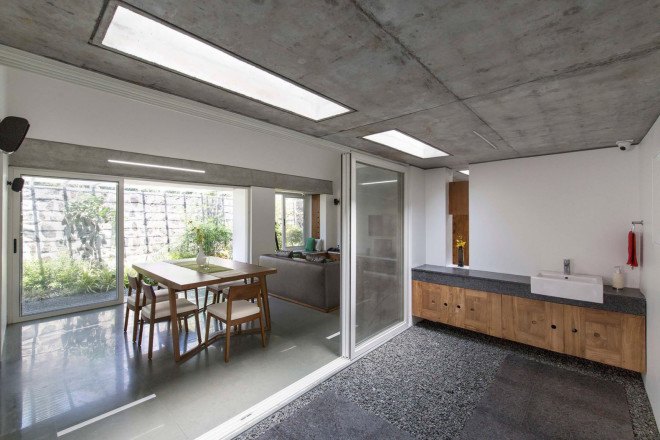 The Walls and Vaults House, India architecture, LIJO.RENY.architects, passive cooling, passive house, stone walls, granite, green architecture, multi-generational home, tropical plants