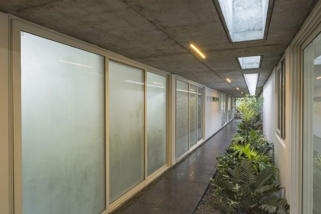 The Walls and Vaults House, India architecture, LIJO.RENY.architects, passive cooling, passive house, stone walls, granite, green architecture, multi-generational home, tropical plants