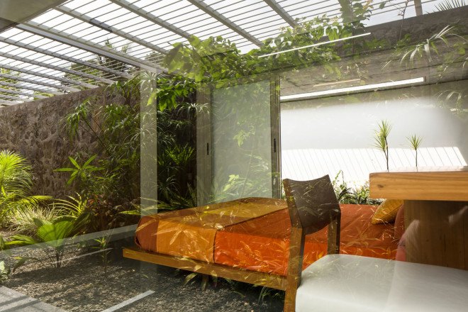 The Walls and Vaults House, India architecture, LIJO.RENY.architects, passive cooling, passive house, stone walls, granite, green architecture, multi-generational home, tropical plants