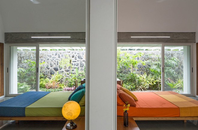 The Walls and Vaults House, India architecture, LIJO.RENY.architects, passive cooling, passive house, stone walls, granite, green architecture, multi-generational home, tropical plants