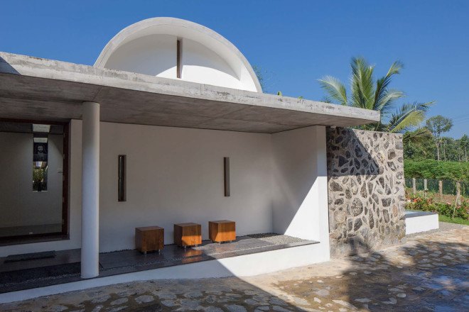 The Walls and Vaults House, India architecture, LIJO.RENY.architects, passive cooling, passive house, stone walls, granite, green architecture, multi-generational home, tropical plants