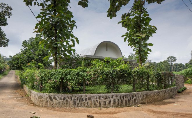 The Walls and Vaults House, India architecture, LIJO.RENY.architects, passive cooling, passive house, stone walls, granite, green architecture, multi-generational home, tropical plants