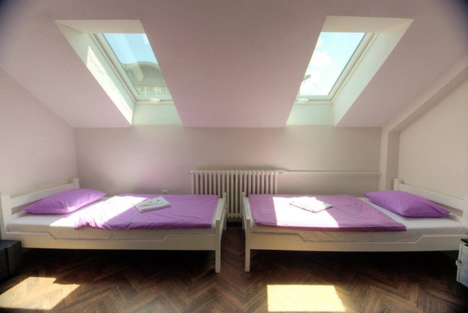 eco-friendly hostel, Belgrade arhitecture, green hostel, upcycling, upcycled materials, repurposed materials, rainwater collection, solar panels, renewable energy, low carbon footprint, green architecture
